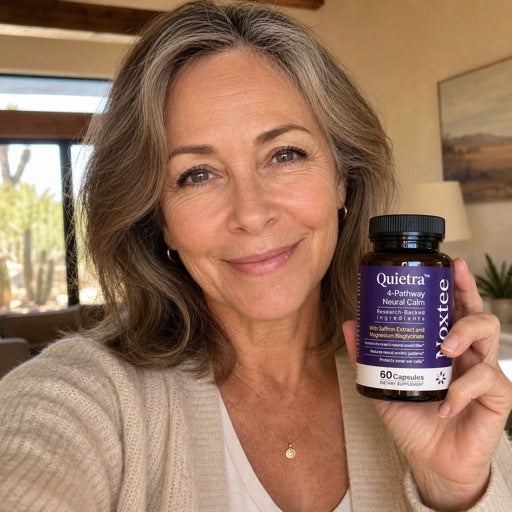 Diane holding a Noxtee bottle