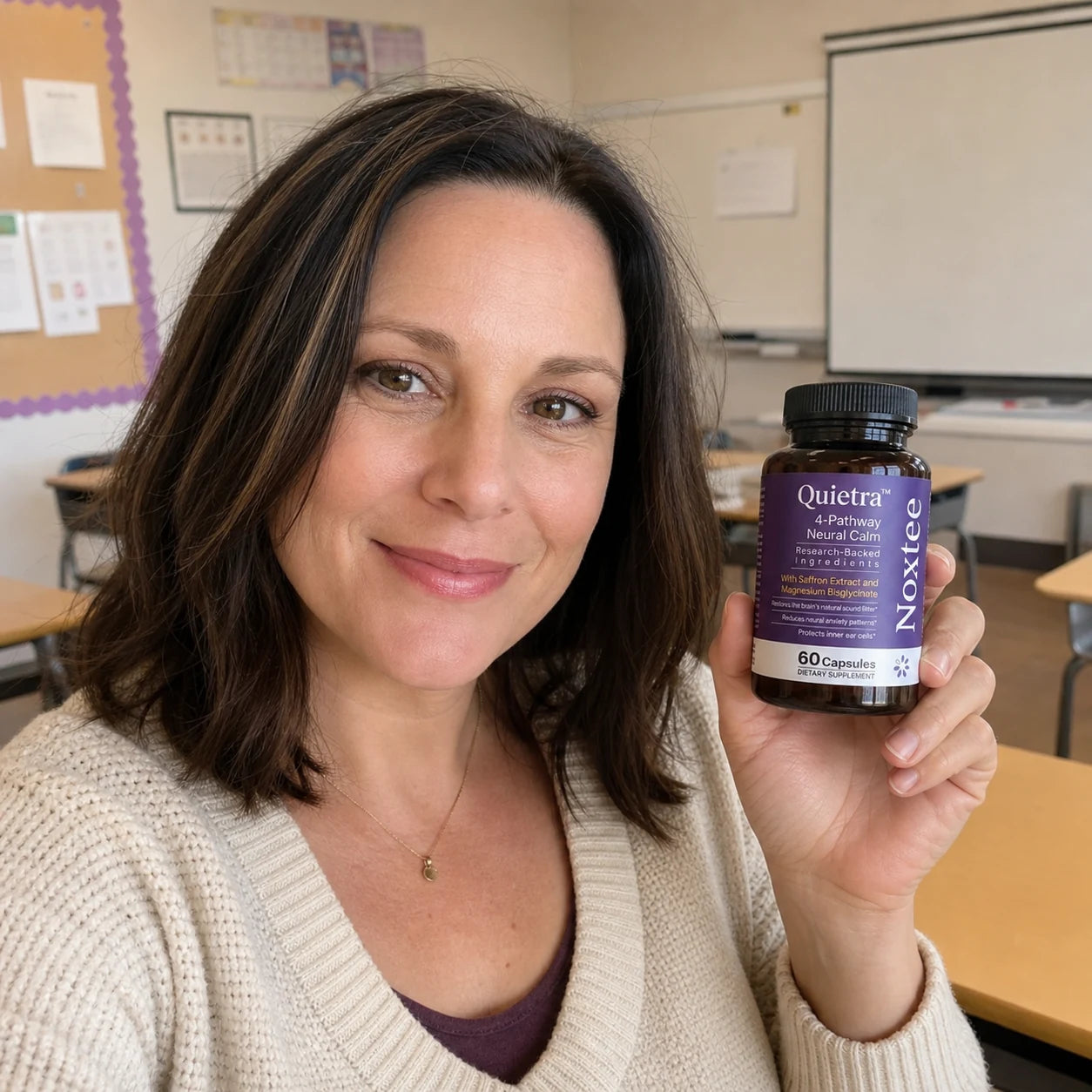 Sarah holding a Noxtee bottle