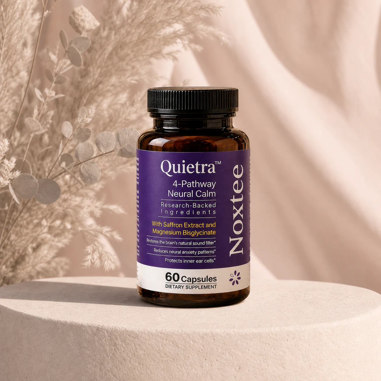 Noxtee bottle on a cream stone pedestal