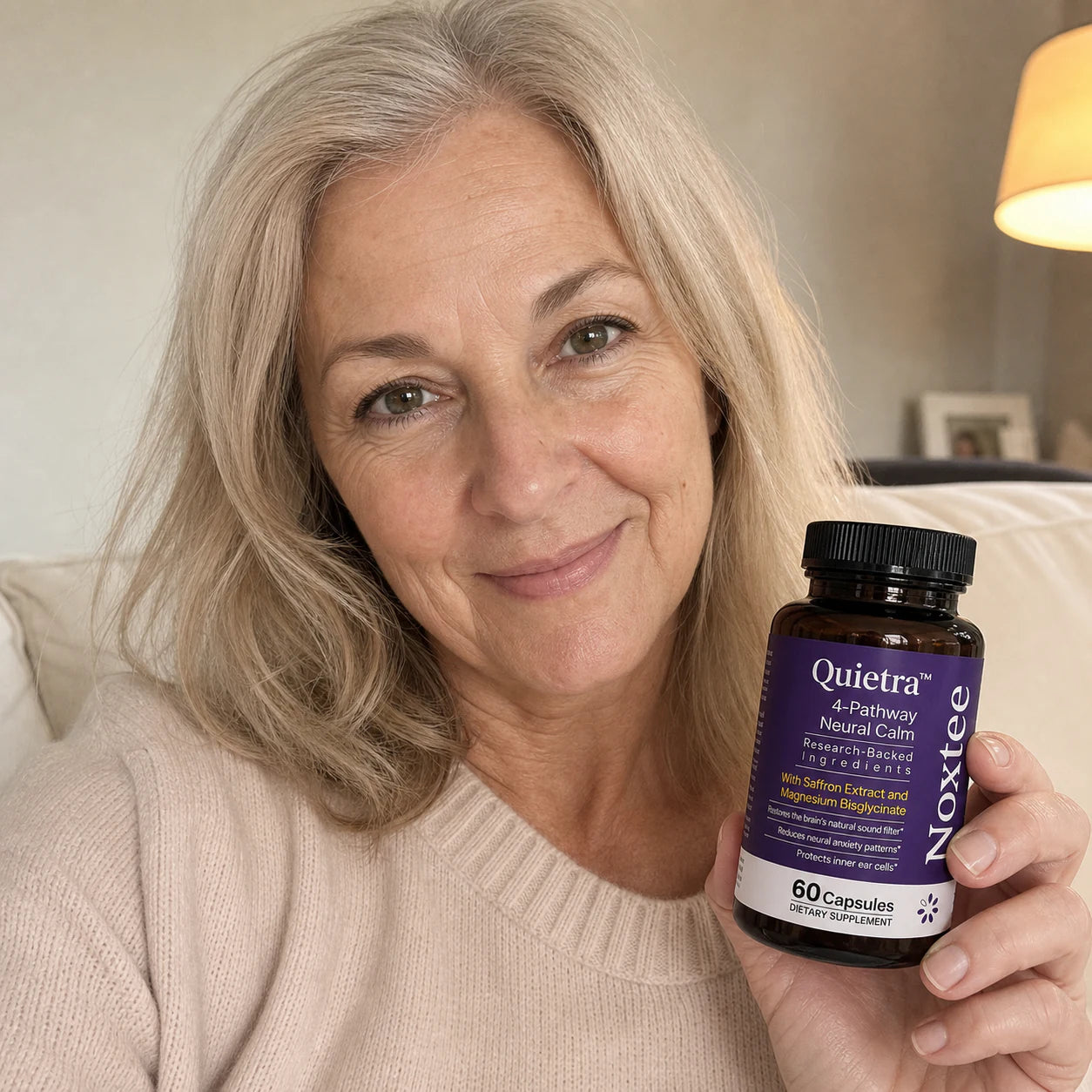 Karen holding a Noxtee bottle