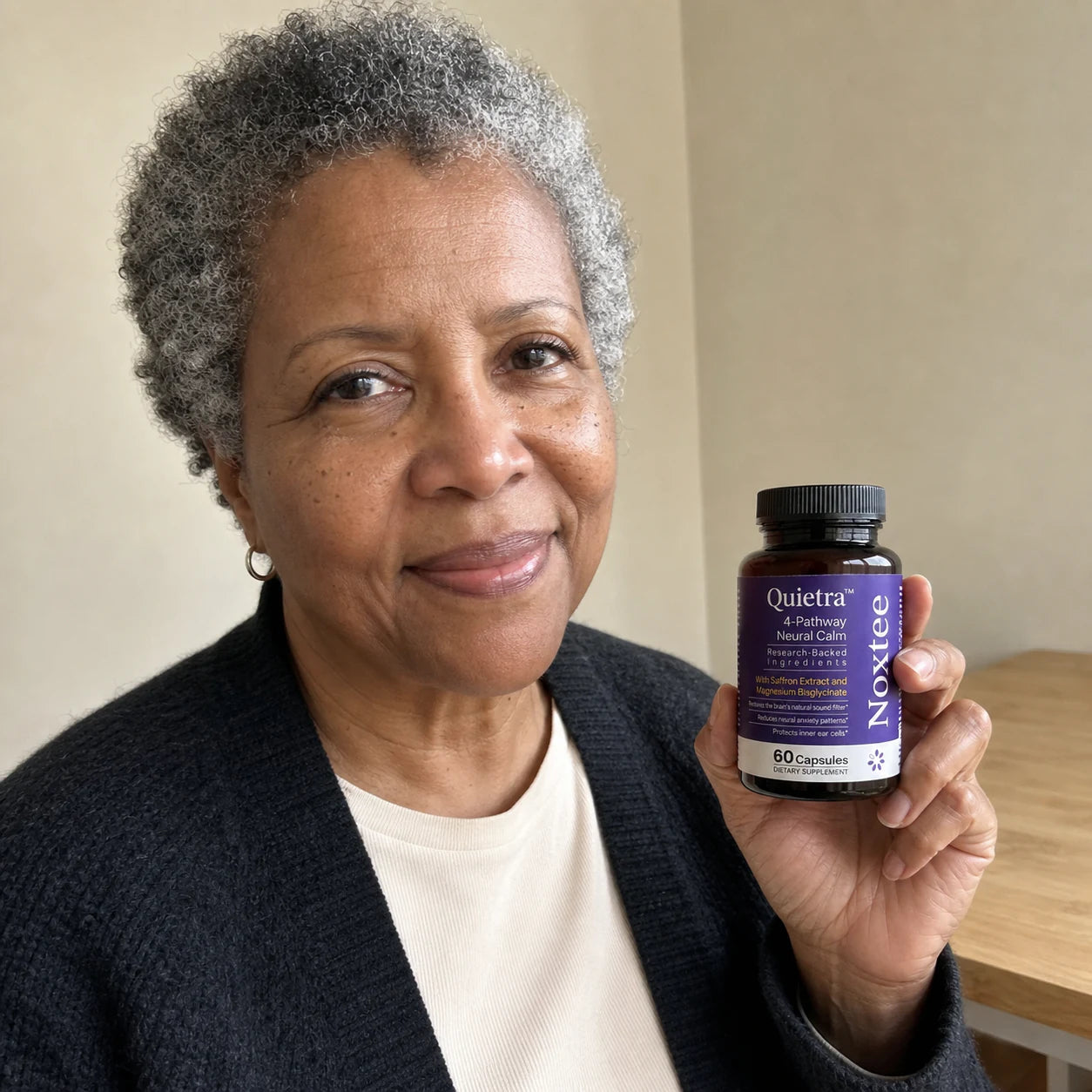 Patti holding a Noxtee bottle