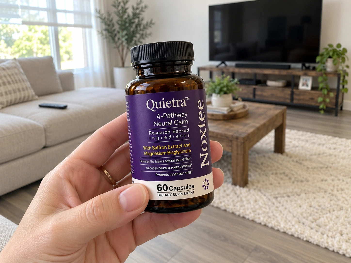 Noxtee Quietra bottle held in a living room